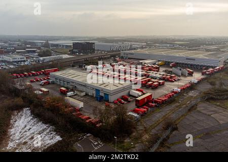 Royal Mail delivery vehicles and cages of mail at the Bristol Filton office. Picture date: Wednesday December 14, 2022. Stock Photo