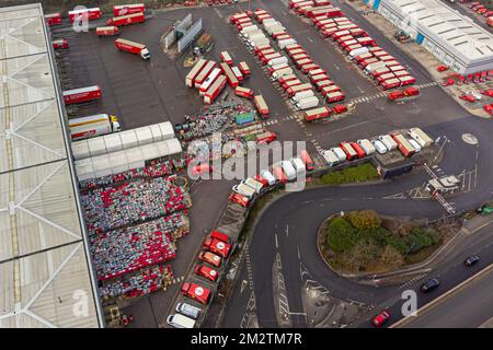 Royal Mail delivery vehicles and cages of mail at the Bristol Filton office. Picture date: Wednesday December 14, 2022. Stock Photo