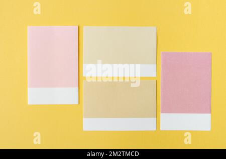 Blank Sticky notes on the yellow background for your text or message. Stock Photo