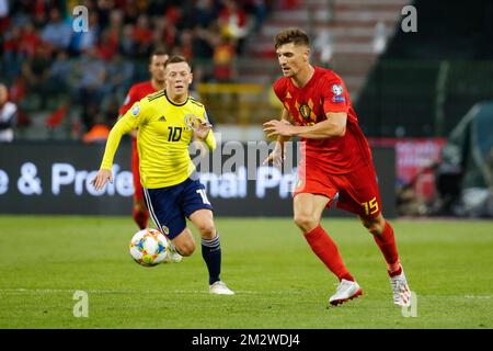 Scotland's Callum McGregor and Belgium's Thomas Meunier fight for the ball during a soccer game between Belgian national team the Red Devils and Scotland, Tuesday 11 June 2019 in Brussels, an UEFA Euro 2020 qualification game. BELGA PHOTO BRUNO FAHY Stock Photo