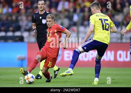 Belgium's Thorgan Hazard and Scotland's Scott McTominay fight for the ball during a soccer game between Belgian national team the Red Devils and Scotland, Tuesday 11 June 2019 in Brussels, an UEFA Euro 2020 qualification game. BELGA PHOTO YORICK JANSENS Stock Photo