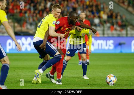 Scotland's Scott McTominay and Belgium's Romelu Lukaku fight for the ball during a soccer game between Belgian national team the Red Devils and Scotland, Tuesday 11 June 2019 in Brussels, an UEFA Euro 2020 qualification game. BELGA PHOTO BRUNO FAHY Stock Photo