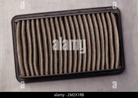 used air filter that must be replaced in the context of car maintenance Stock Photo
