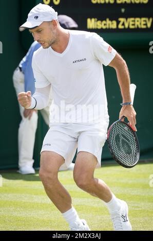 Belgian Steve Darcis celebrates after the match between Belgian Steve Darcis and German Mischa Zverev in the men's singles first round at the 2019 Wimbledon grand slam tennis tournament at the All England Tennis Club, in south-west London, Britain, Monday 01 July 2019. BELGA PHOTO BENOIT DOPPAGNE Stock Photo