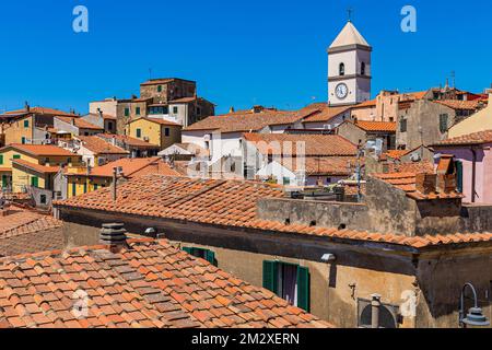 Above the roofs of Capoliveri in the back the steeple of the