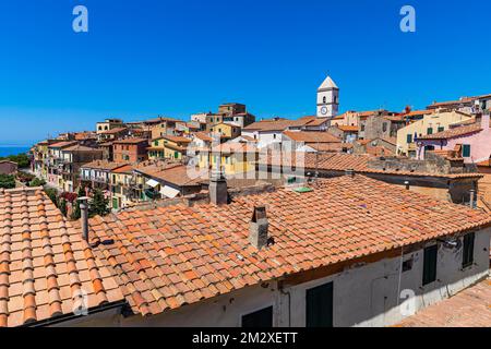 Above the roofs of Capoliveri in the back the steeple of the