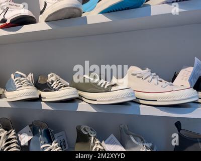 Converse in showcase. Shoe concept on showcase. Istanbul, TURKEY- 13 December 2022 Stock Photo