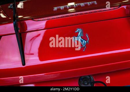 Ferrari emblem logo trademark rearing horse Cavallino Rampante on rear of red Italian sports car Ferrari 458 Challenge, Spa Francorchamps, Belgium Stock Photo