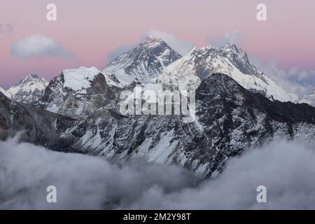 Breathtaking sunset over Mount Everest summit colored in an