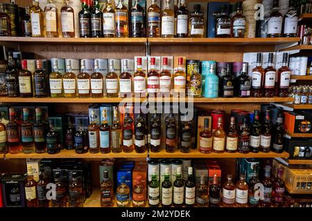 Various whisky bottles on a shelf, Oban, Argyll and Bute, Scotland, Great Britain Stock Photo