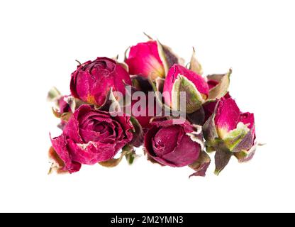 Heap of dry tea roses buds isolated on white background. Rose flower tea. Phnom Penh rose tea. Clipping path Stock Photo