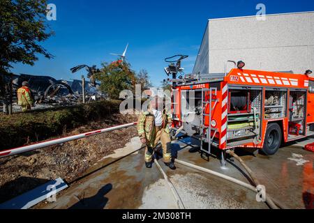 Illustration picture shows firemen in action on the scene of a fire in the Dimabel waffle factory in Ieper, Friday 20 September 2019. The factory burned down in the early hours of Friday. BELGA PHOTO KURT DESPLENTER Stock Photo