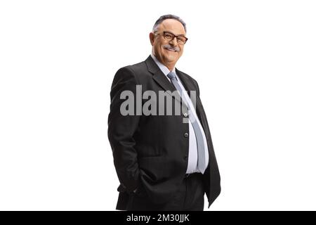 Smiling mature businessman posing with hands in pockets isolated on white background Stock Photo