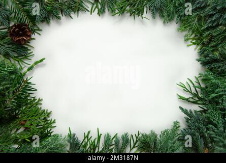Christmas green framework isolated on white background. Pine, cypress, thuja branches. New year mock up. Copy space. Stock Photo