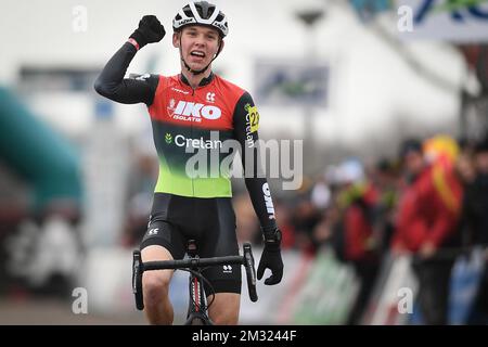 Belgian Aaron Dockx celebrates as he crosses the finish line to win the ...