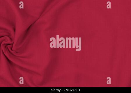 Abstract linen blend wavy fabric texture background. Crumpled pink, viva magenta color dyed linen textiles canvas background. Top view Stock Photo