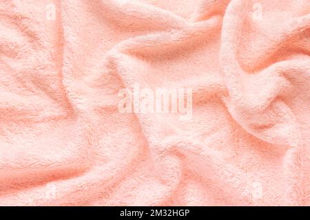 soft pink texture of bath towel folded, background Stock Photo