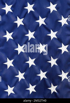 White stars on blue fabric of United States American flag Stock Photo