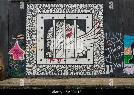 Graffiti on the Separation Wall in Bethlehem, West Bank, Palestine. Stock Photo