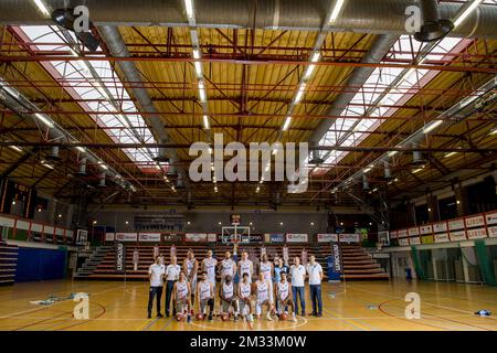 upper row (L-R), assisten coach Phivos Livaditis, assistant coach Fred Young, Ryan Richards, Viktor Iljins, Stephane Moris, Pavle Djurisic, Benjamin Raymond, General Manager Nikkel Kebsi, Brussels' chairman Andre De Kandelaer, Head coach Ian Hanavan, lower row (L-R), Brussels' William Robeyns, Ayoub Nouhi, Thomas Massamba, Sean Pouedet, Louis Hazard and Elijah Tshibangu pose at a photoshoot of Belgian Basketball team Phoenix Brussels, ahead of the 2020-2021 EuroMillions League, Friday 09 October 2020 in Brussels. BELGA PHOTO JASPER JACOBS Stock Photo