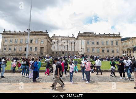 Simon Bolivar statue monument located in center of Bolivar square with Capitol Building at background Stock Photo