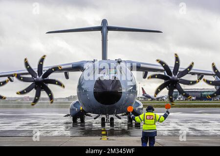 Illustration picture shows the arrival of an A400M transport airplane of the Belgian Defence, at the military airport in Melsbroek, Steenokkerzeel, Tuesday 22 December 2020. In total, Belgium has ordered eight A400M aircraft, one of which is on behalf of Luxembourg, to replace the current C-130s. Capable of conducting tactical missions and strategic flights of up to 5,400 kilometers, the A400M must fill a gap that European armies have repeatedly had to identify in terms of air transport. The aircraft has a length of 45 meters and a wingspan of 42 meters and can not only transport heavy equipme Stock Photo