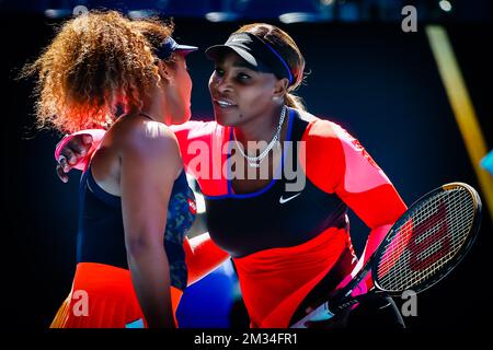Japanese Naomi Osaka (WTA 3) and US' Serena Williams embrace after their tennis match in the semifinals of the women's singles competition of the 'Australian Open' tennis Grand Slam, Thursday 18 February 2021 in Melbourne Park, Melbourne, Australia. BELGA PHOTO PATRICK HAMILTON Stock Photo