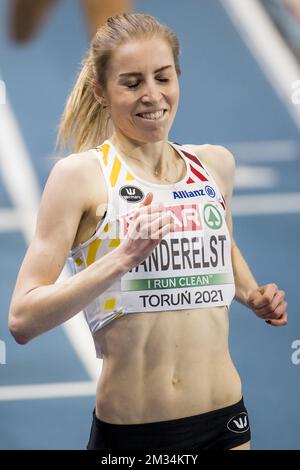 Belgian Elise Vanderelst celebrates as she crosses the finish line to