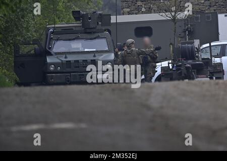 Illustration picture shows heavily armed soldiers at the entrance to Nationaal Park Hoge Kempen in Maasmechelen, Thursday 20 May 2021. Police continues to look for a heavily armed professional soldier, Jurgen Conings, in the province of Limburg. The 46-year old man made threats against virologist Van Ranst who is brought to safety. BELGA PHOTO DIRK WAEM  Stock Photo