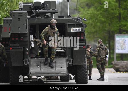 Illustration picture shows heavily armed soldiers at Nationaal Park Hoge Kempen in Maasmechelen, Thursday 20 May 2021. Police continues to look for a heavily armed professional soldier, Jurgen Conings, in the province of Limburg. The 46-year old man made threats against virologist Van Ranst who is brought to safety. BELGA PHOTO DIRK WAEM  Stock Photo