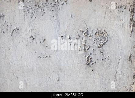 old plaster texture on a cement wall destroyed by weather and time Stock Photo