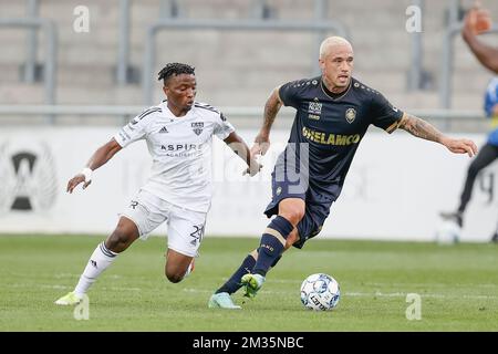 Eupen's Isaac Nuhu and Antwerp's Radja Nainggolan fight for the ball during a soccer match between KAS Eupen and Royal Antwerp FC, Saturday 11 September 2021 in Eupen, on day 7 of the 2021-2022 'Jupiler Pro League' first division of the Belgian championship. BELGA PHOTO BRUNO FAHY Stock Photo