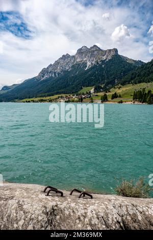 A vertical shot of the Sufnersee reservoir on the Hinterrhein river in the Grisons, Switzerland. Stock Photo