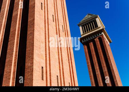 Two Venetian towers in Barcelona, made of exposed brick, built during the universal exhibition of 1929. Stock Photo