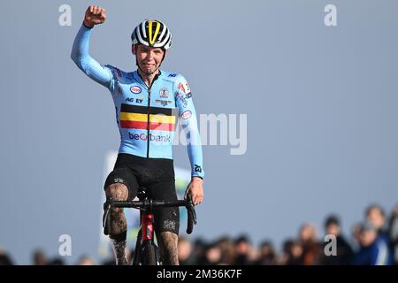 Belgian Aaron Dockx celebrates as he crosses the finish line to win the ...