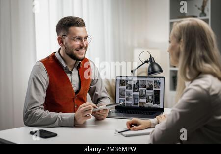 Designer with Client in Office Stock Photo