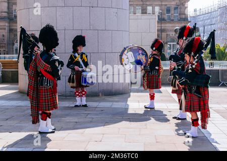 City of Leeds Pipe Band performing in Millennium Square. Leeds, West Yorkshire, Yorkshire and the Humber, England, United Kingdom, Europe Stock Photo