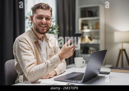 Young businessman smiling Stock Photo