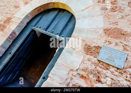 Entrance door with plaque of the UNESCO declaration. The San Millán Suso Monastery was founded by San Millán in the 6th century. The monastery consist Stock Photo