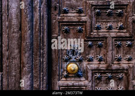 Weathered door with peeling paint. Almagro, Ciudad Real, Castila La Mancha, Spain, Europe Stock Photo