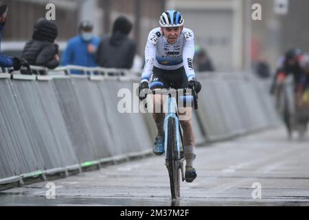 Belgian Aaron Dockx crosses the finish line to win the men U23 race of ...