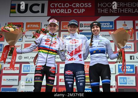 Dutch Fem Van Empel, Dutch Puck Pieterse and Dutch Shirin Van Anrooijen celebrates on the podium after the women's elite race of the Cyclocross Hoogerheide cycling event, final round of the UCI Cyclo Cross World Cup Saturday 22 January 2022 in Hoogerheide. BELGA PHOTO DAVID STOCKMAN Stock Photo