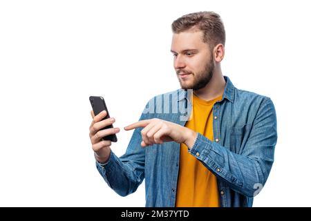 Man scrolling smartphone Stock Photo