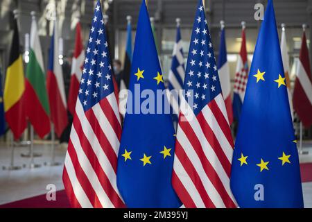 Illustration picture shows the European and US flags during a meeting of European council, in Brussels, Thursday 24 March 2022, at the European Union headquarters in Brussels. The European Council will discuss the Russian military aggression against Ukraine, security and defence, energy, economic issues, COVID-19 and external relations. BELGA PHOTO POOL NICOLAS MAETERLINCK  Stock Photo