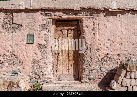 a house made of clay and red bricks in the countryside of Aregenina in the Andes mountains Stock Photo