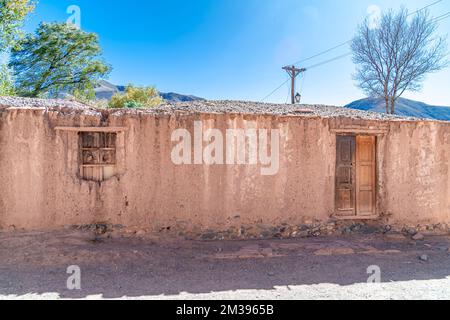 a house made of clay and red bricks in the countryside of Aregenina in the Andes mountains Stock Photo