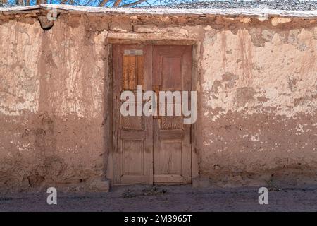 a house made of clay and red bricks in the countryside of Aregenina in the Andes mountains Stock Photo