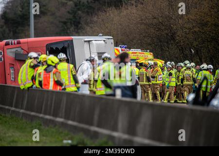 Emergency services pictured at the scene of a traffic accident involving a coach bus on the E19 highway in Sint-Job-in-'t-Goor, Brecht on Sunday 10 April 2022. According to the first information multiple people died when a French bus crashed. BELGA PHOTO JONAS ROOSENS  Stock Photo