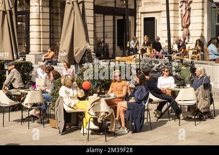 Illustration shows people enjoying nice weather at Belgian coast, in De ...