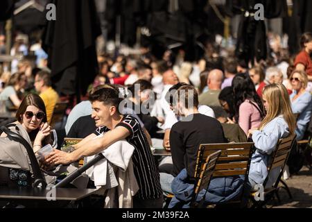 Illustration shows people enjoying nice weather at Belgian coast, in De ...